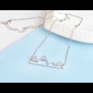 Mountain necklace in silver brand new